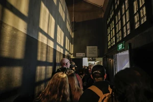 people walking down a hallway in Vietnam